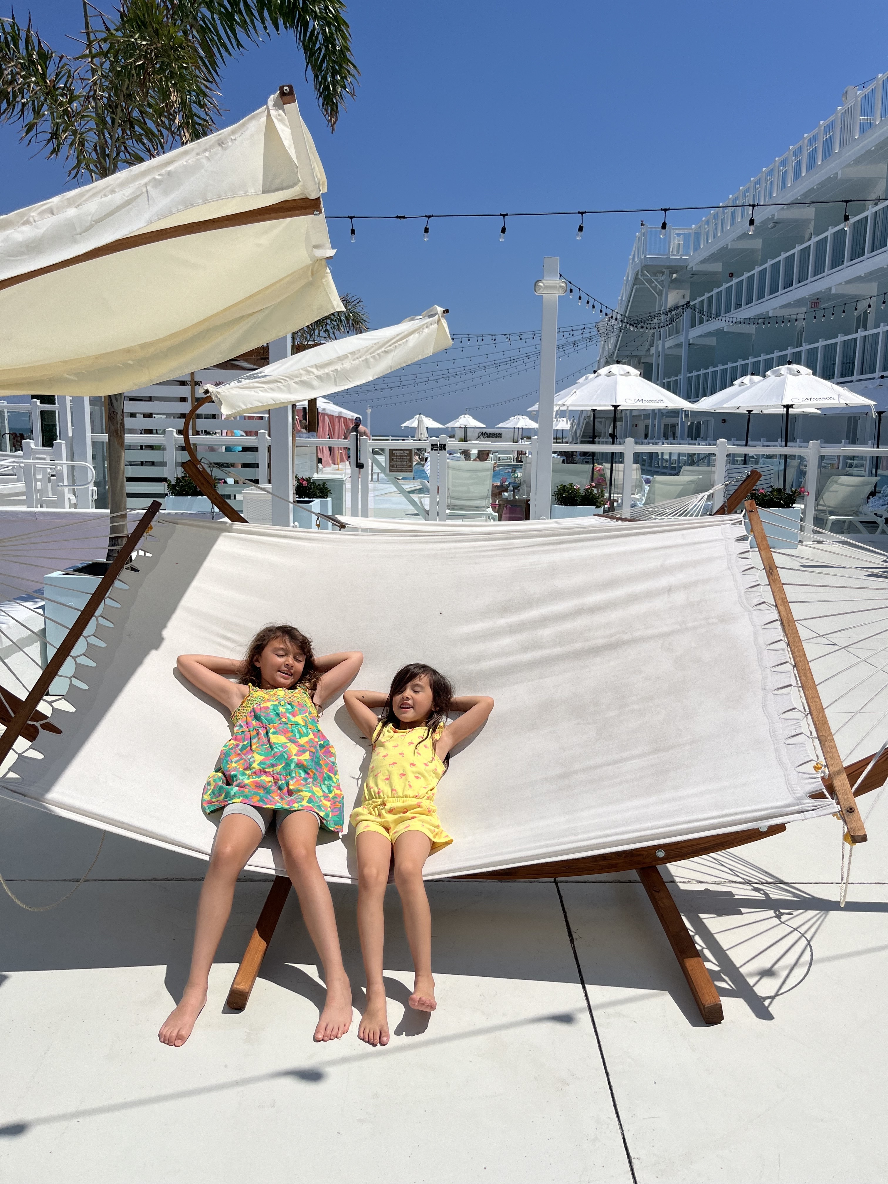 Guests on Giant Hammock at Madison Resort